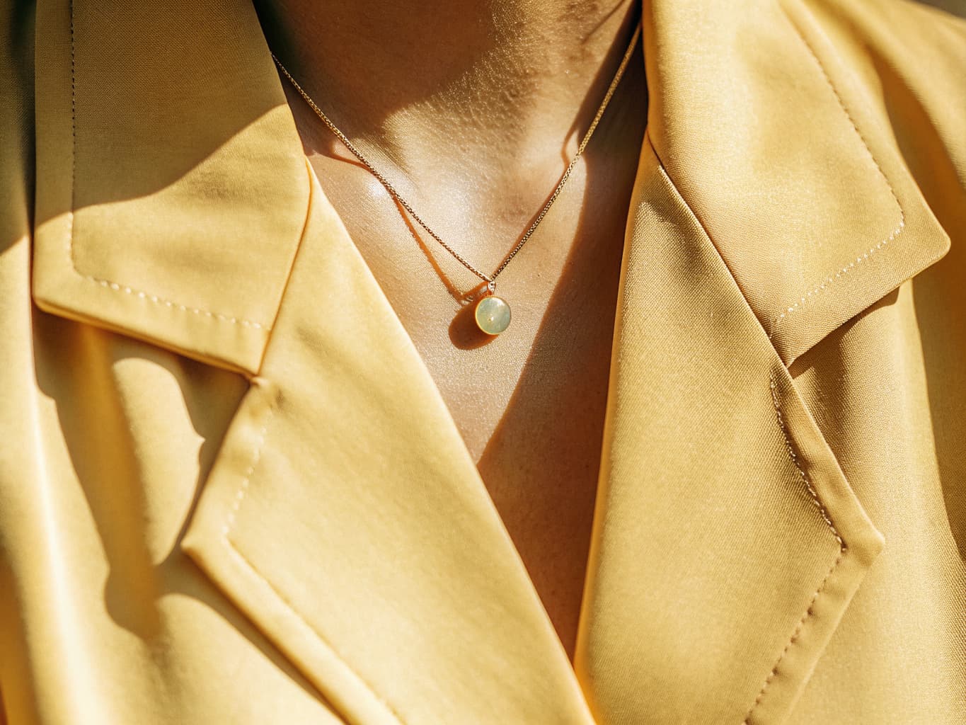 Elegant discreet day collar pendant worn with a professional office outfit