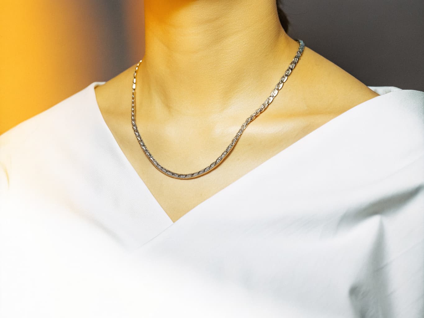 Thin discreet day collar chain worn as an elegant everyday necklace